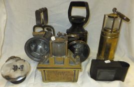 Six miner's lamps to include a safety hand lamp by WM McGeoch Limited, Birmingham and a lamp by "The