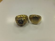 Two 18 carat gold rings, one with stone set floral cluster