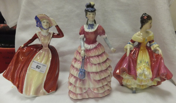 A Royal Doulton figurine "Southern Belle", model No. HN 2229, a Royal Doulton figurine "Mary", model