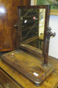 A 19th Century mahogany dressing mirror, the rectangular mirror on turned supports to a