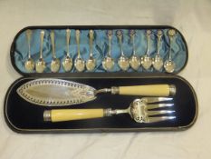 A collection of twelve various golf and bowling commemorative spoons, together with a cased silver