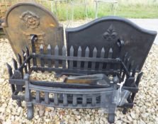 Two metal fire backs and a fire basket    CONDITION REPORTS  Wear, rusting.  Fire basket has no