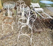 Four white painted iron garden chairs, together with various folding iron framed garden chairs