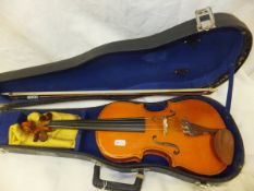 A "The Stentor Student" child's violin and bow, housed in a black carrying case