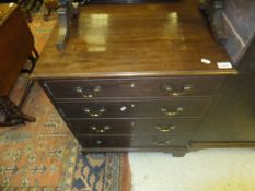 A 19th Century mahogany converted commode, the two doors as four drawers on bracket feet