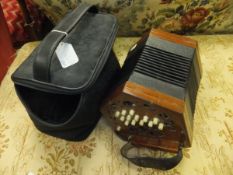 A vintage Lachenal type concertina, housed in a soft carrying case
   CONDITION REPORTS  Various