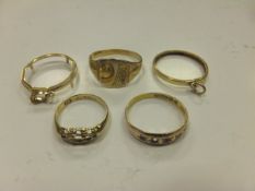 Three gold rings, together with two gold mounts