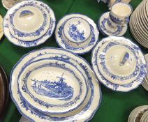 A collection of Royal Doulton "Norfolk" pattern dinner and tea wares to include two lidded