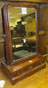 An early 19th Century toilet mirror, the rectangular top above three various drawers