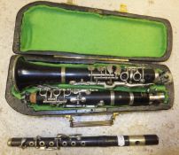 A clarinet stamped "Gbr Alexander Mainz", housed in a small shaped carrying case, together with a