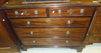 A late 18th / early 19th Century mahogany chest of two short and three long drawers on bracket feet