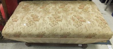 A Victorian mahogany framed ottoman with fabric covered sloping sides and rectangular top