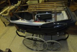 A mid 20th century Osnath full size coach-built pram, together with a vintage beech Davos sledge