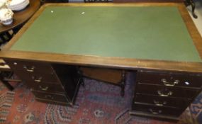 A 19th Century mahogany rectangular desk, the leather insert top above two pedestals of four drawers