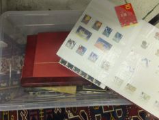Two boxes containing various stamp folios to include mainly British mid 20th Century and later