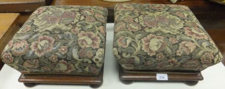 A pair of small 19th Century square footstools with tapestry upholstered tops