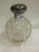 A George V silver mounted cut glass grenade scent bottle (London, 1916)   CONDITION REPORTS  Wear,