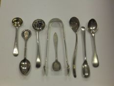 Five various spoons plus a silver sifter spoon, pair of sugar tongs and a plated Masonic spoon