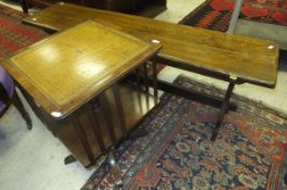 An oak bench with trestle base, together with a mahogany two tier book table