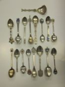 A collection of Continental white metal teaspoons, some marked "800"