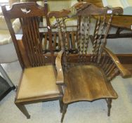 A circa 1900 American oak barley twist spindle back elbow chair on turned legs united by stretchers,