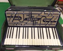 A Hohner Verdi III accordion with blue Art Deco style decoration, housed in a black carrying case