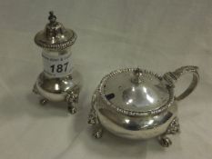 A George V silver cauldron lidded mustard (London, 1918), with blue glass liner, together with a
