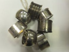 A selection of seven various silver napkin rings