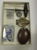 A box of sundry items to include 19th Century corkscrew, marching compass, a medallion inscribed "