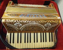 A Settimio Soprani Rialto accordion with glitter gilt effect finish and inset rhinestones, housed in