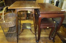 A mahogany two tier square topped centre table, two Far Eastern hardwood coffee tables and a