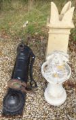 A Victorian cast iron hand water pump, together with a composite stone chimney pot, and a Disney