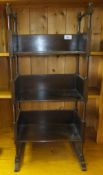 An early 20th Century miniature rosewood three tier open bookcase