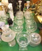Two cut glass decanters with star cut bases, three sweetmeat dishes and six brandy balloons