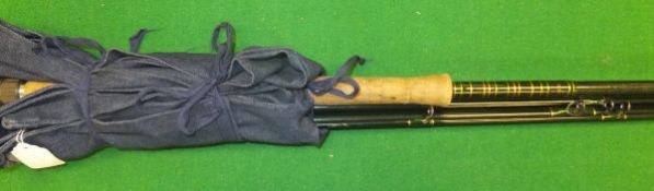 A 16 ft. #11/12 four piece salmon fly rod, marked "MHT" on the butt section, with cloth bag