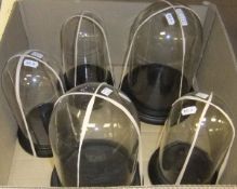 A collection of five various display domes   CONDITION REPORTS  Heights range from approx. 26 cm