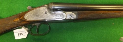 A Berretta 12 bore shotgun, 3" Magnum, double barrel, side by side, side lock, ejector, 27½" barrels