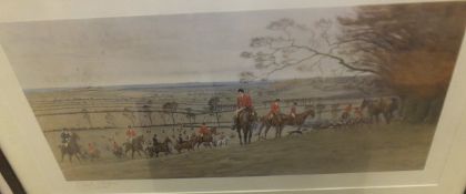 AFTER CECIL ALDIN "Huntsmen and hounds in an extensive landscape", colour print, signed in