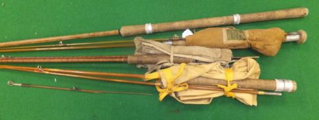 A collection of four assorted fishing rods - an Apollo, a Sealey, and two un-named split cane rods