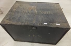 A japanned compartmented tin storage box used for transporting fish