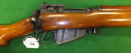A World War II Lee Enfield No. 4 Mk 1 bolt action rifle, re-bored as .410, 25" barrel (No. 74C2779)