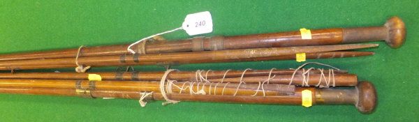 Two Victorian greenheart two piece spliced joint salmon fly rods, one measuring 18 ft. and the other