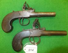 A matched pair of William Jover of London flintlock pistols with walnut stocks