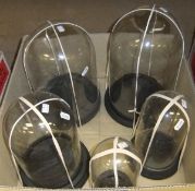 A collection of five various display domes   CONDITION REPORTS  Heights range from approx. 33 cm