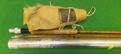 A Hardy "Deluxe" 9 ft 6" three piece split cane trout fly rod, with spare tip, makers cloth bag
