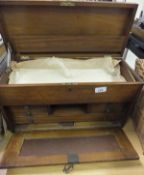A mahogany collectors case comprising a set of concealed drawers behind a drop down panel and a