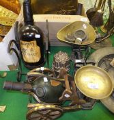 A set of Avery scales and assorted weights, a copper jelly mould and two bottles mounted on stands