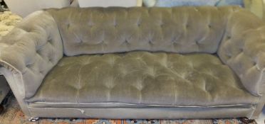 A buttoned upholstered three seat chesterfield sofa   CONDITION REPORTS  Assorted wear throughout