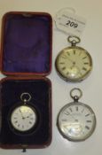 A collection of three silver pocket watches, each set with white enamelled dial and Roman
