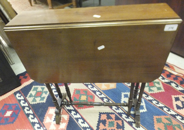 An Edwardian mahogany Sutherland table